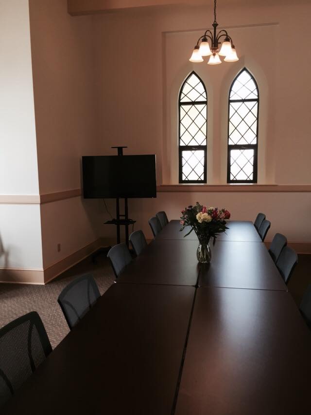 Interior of gate house with tables set up for an event